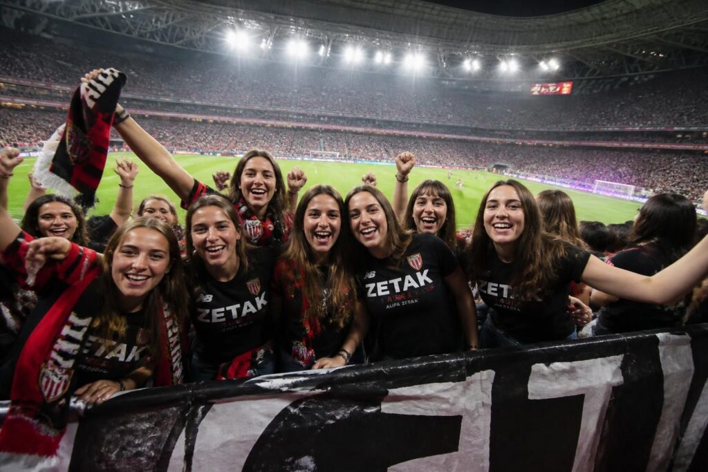 descubre cómo las primeras seguidoras del grupo zetak llenan san mamés con su pasión y energía, expresando su deseo de estar en primera fila durante cada concierto.